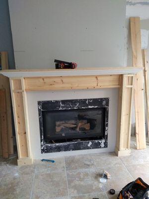 Moved fireplace and electrical and new mantle...