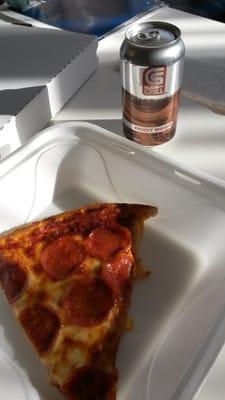 My free piece of pizza and a can of rootbeer.