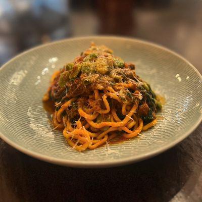 Maccheroni alla chitarra with a lamb ragu, fava beans, mint, pecorinos