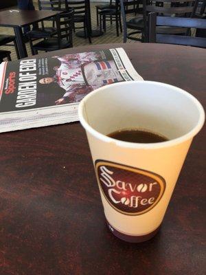 Coffee and newspaper