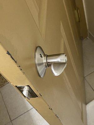 Bathroom door lock broken. Can't open from inside