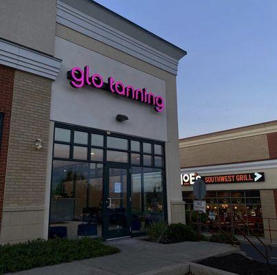 Glo Tanning, located in the Bartonsville Plaza. Next to Moe's and Dunkin' Donuts.