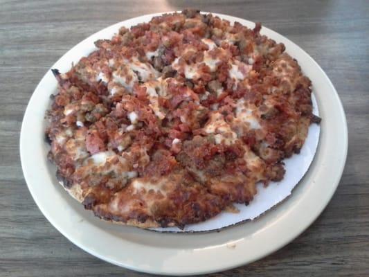 8" Meat Amore pizza.