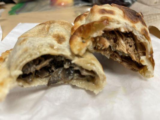 Left: Mushroom, cheese & thyme empanada. Right: Malbec beef empanada.