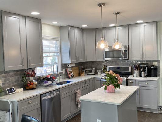 Cabinets, electrical, and quartz countertop