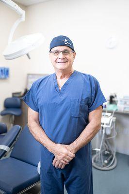 Dr. Michael A. Pikos, board-certified oral surgeon, owner, and founder of Coastal Jaw Surgery