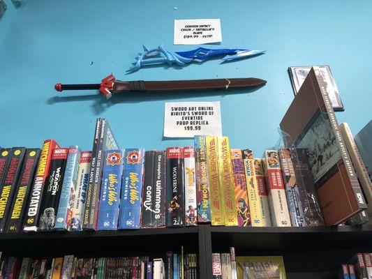 Graphic novels, facsimile weapons, and toys!