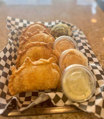 Create your perfect combination with our customizable 4-pack of empanadas. Choose any four empanadas from our menu to craft your ideal meal