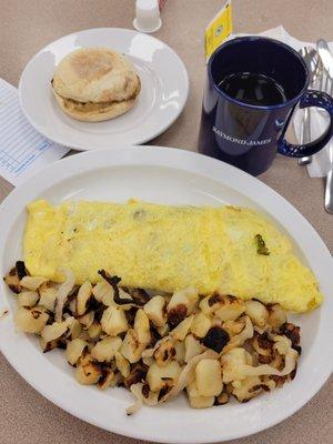 Western omelet with hash browns and English muffin.