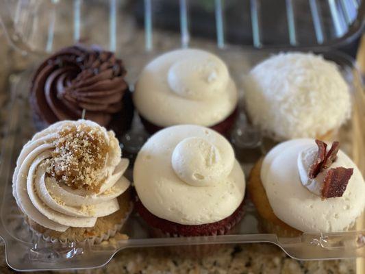 Back left: double chocolate, red velvet, very coconut  Front left: sweet potato pie, red velvet, turkey bacon maple crunch