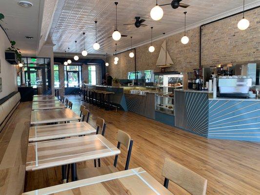 Main seating area, nice mix of tables/booths and barstools.