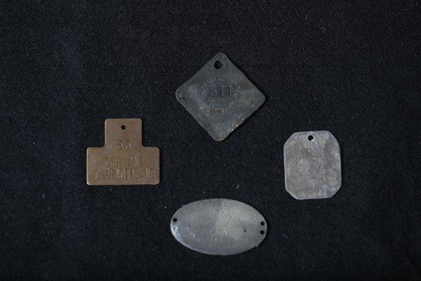 Slave tags were required for slaves traveling  alone at night given permission from a slave owner