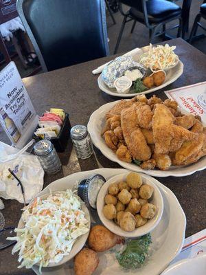 Seafood platter for two with shrimp, oysters, scallops, stuffed crab, scallops and 4 sides!