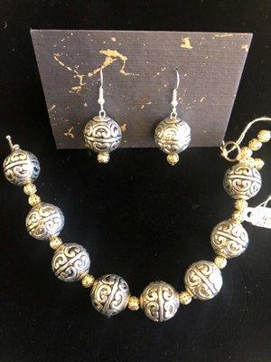 Silver tone filigree with gold tone accent earrings and bracelet $40