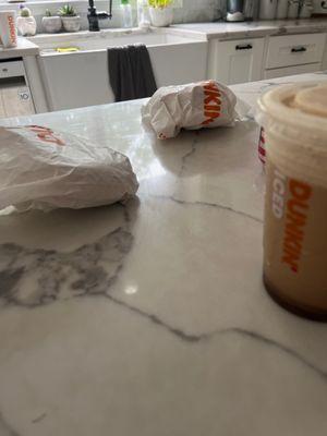 Small coffee even tho thats not what i ordered, two sandwiched and a donut