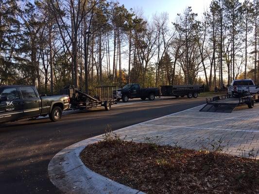 Unloading the fall clean up equipment on an early fall morning.  The Grounds Crew offers fall clean up services for all types of properties.