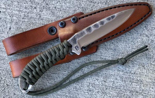 Range 37 hand forged knife with a full leather, hand built scabbard by Chattanooga Leather Works.