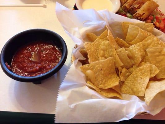 House salsa with fresh made tortillas.