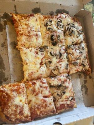 Half mushroom Sicilian pizza