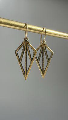 Grand Vault earrings with hammered 18k gold sugar detail.