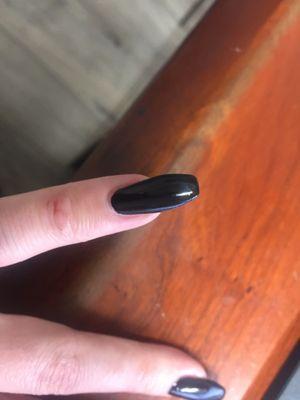 What I actually got. A lumpy nail with cuticles clearly viable.