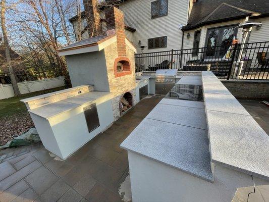 Outdoor kitchen with pizza oven