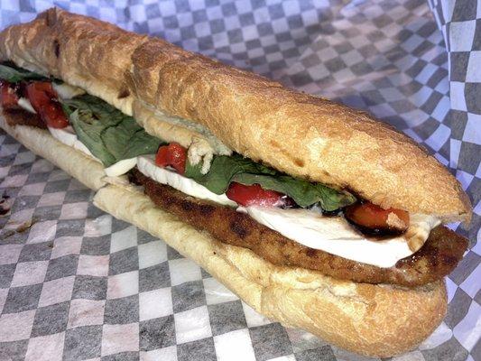 Chicken, cutlet sandwich with fresh mozzarella, tomatoes, basil and balsamic reduction... Delicious!