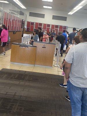 26 customers in line with 3 tellers