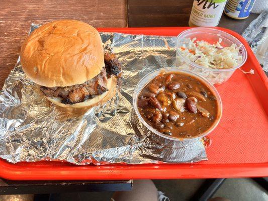 Brisket sandwich, coleslaw on the side, baked beans