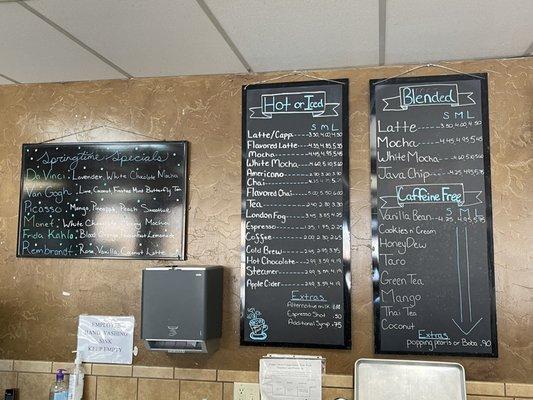 Menus on the wall behind front.