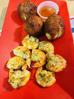 Stuffed shrimp (with crab) and hush puppies.