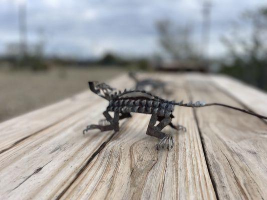 Some decor on the picnic table outside of the hotel.