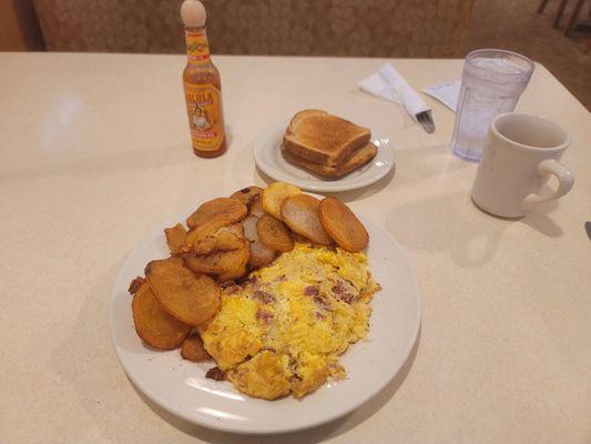 German omelet with American fries and wheat toast