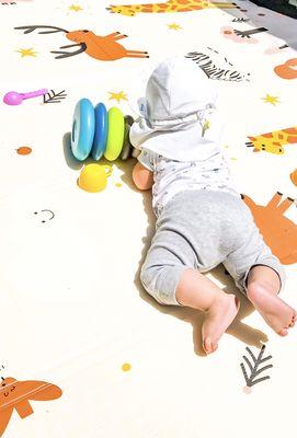 infant enjoying some sun in our backyard