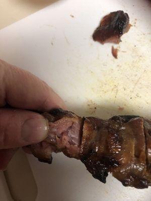 Raw in the middle BBQ pork skewer