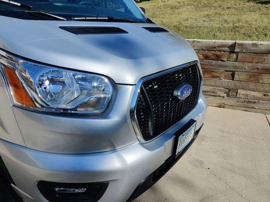 Clear bra covering front bumper, hood and headlights