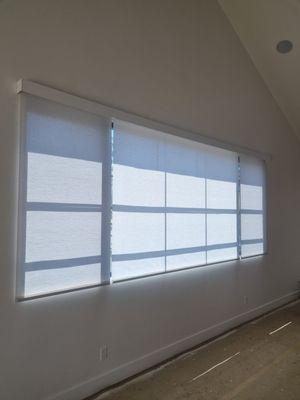 Motorized roller shades