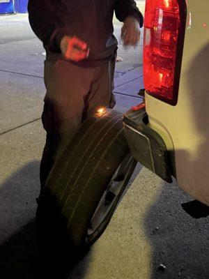 Lee vulcanizing the flat tire fix