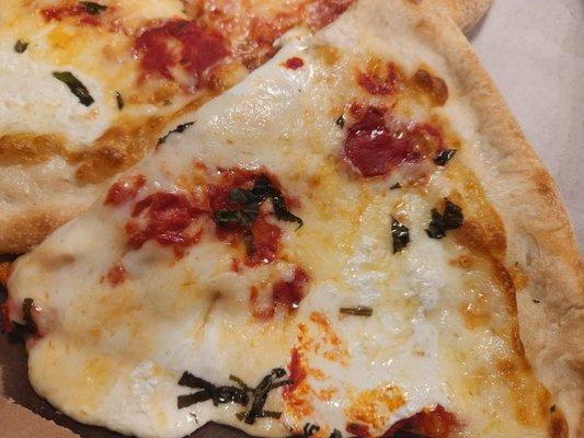 Margarite Pizza is GREAT. They make the mozzarella fresh every morning.