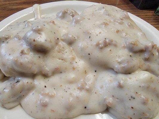 Single biscuit and sausage gravy.