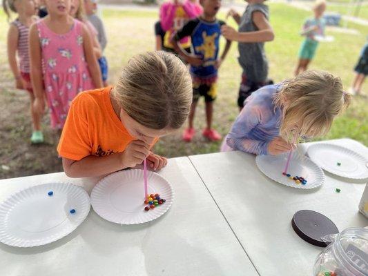 Here is my daughter playing a game during Minute to Win it Week.