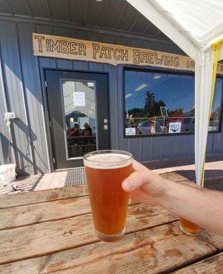 Enjoying the Grassy Mountain Wheat on the toasty summer day we stopped by.