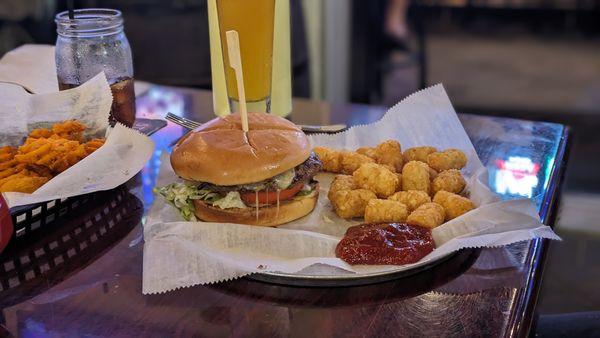 Order your burger with a side of french fries, tater tots, or house salad