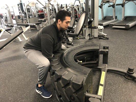 Roy demonstrating the mechanical tire. Great full-body workout.