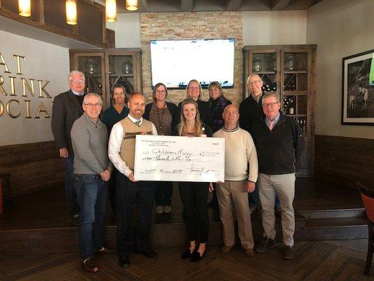 Sertoma Sound of the City 5K-10K Check Presentation November 14 2018 to Childrens Mercy Audiology Dept and KS School for the Deaf. Joshua H