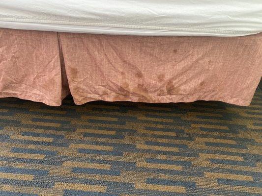 Stained bed skirt; not even too sure exactly what that is.