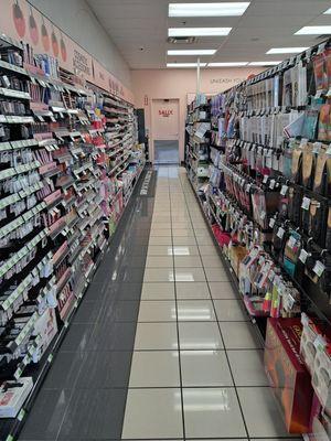 Nail/hair extensions/ makeup/jewelry isle(left isle)