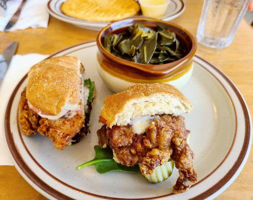 Chicken sandwich with side of greens