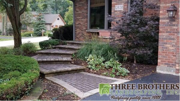 Unilock Pavers and Walls with new plantings.