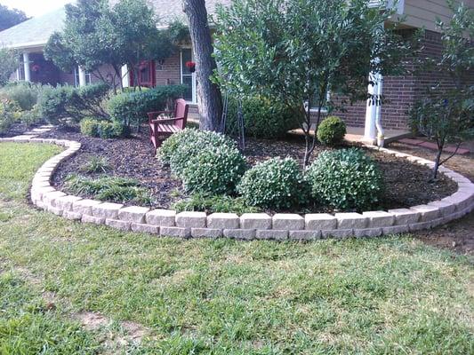 Pavestone Flower Beds can make a home look beautiful and new again.